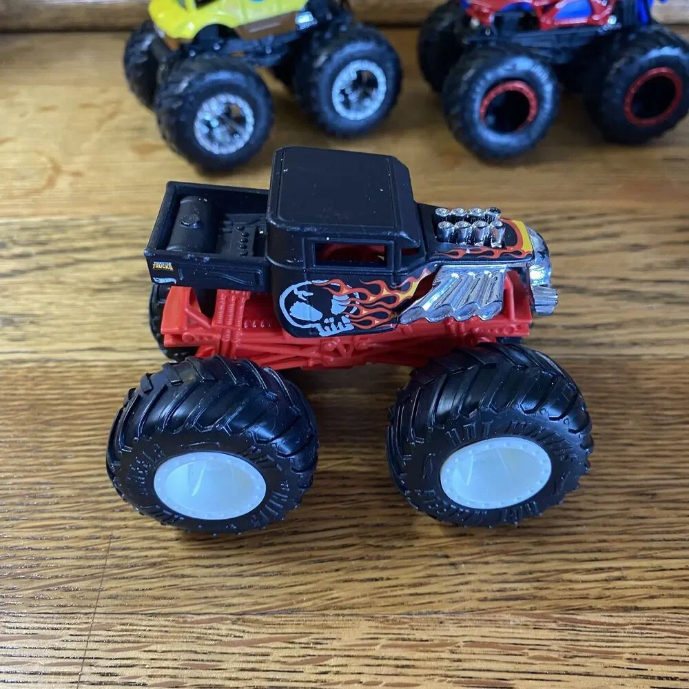Lot of 4 Toy Monster Trucks Sponge Bob Spider Man Hot Wheels 4 Inch